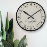 Horloge Ronde Rustic Paper 1st Wedding Anniversary Wall Clock<br><div class="desc">Celebrate your first wedding anniversary with a rustic parchment paper clock with roman numerals. Just add your names and wedding date and hang it on your wall.</div>