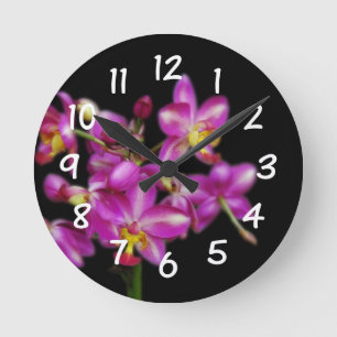 Horloge Ronde Salon - Orchidées violettes sur arrière - plan noi