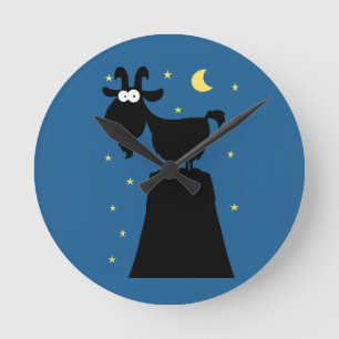 Horloge Ronde Silhouette de chèvre sur la montagne
