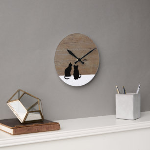 Horloge Ronde Silhouettes de chats noirs modernes sur bois