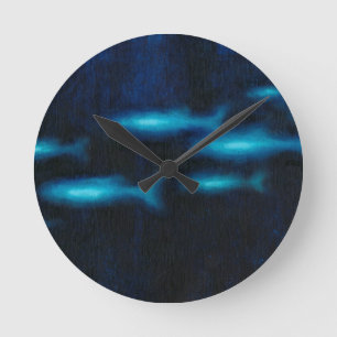 Horloge Ronde Silhouettes translucides bleues de poissons