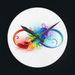 Horloge Ronde Symbole d'infini avec plume arc-en-ciel<br><div class="desc">Symbole artistique à l'infini avec belle plume arc-en-ciel sur arrière - plan blanc. Style tatouage.</div>