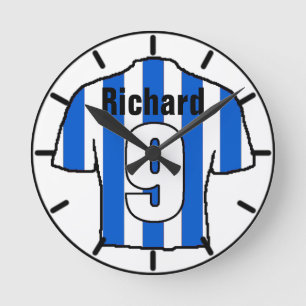 Horloge Ronde T-shirt fan de football.