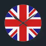 Horloge Ronde The Union Jack Flag<br><div class="desc">The Union Jack Flag of the UK - United Kingdom, which is in Britain. The Union Jack flag symbolizes the unity between England, Scotland and Ireland. The colors of the union jack flag are red, blue, white. This design is also available on many other products for you to choose from....</div>