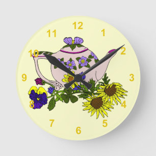 Horloge Ronde Théière rose avec des fleurs sur le jaune