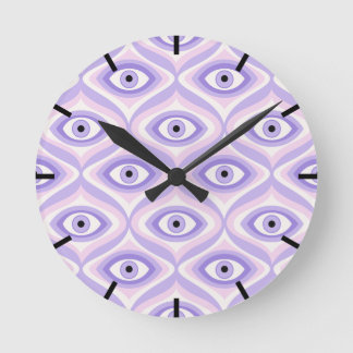 Horloge Ronde Trippy oeil motif pastel violet rose rétro moderne