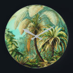 Horloge Ronde Vintage Ernst Haeckel Palmiers Botaniques Grande H<br><div class="desc">Ce design a été créé à l'aide d'une lithographie victorienne ancienne de filicinae fougères palmiers de 1904 par le célèbre artiste et biologiste Ernst Haeckel. Cette illustration particulière représente une étude filicinae de fougères multiples et a contribué à intégrer l'idée du darwinisme et de l'évolution vers l'Europe. Nous avons créé...</div>