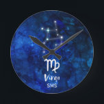 Horloge Ronde Virgo Zodiac Constellation Blue Galaxy Monogram<br><div class="desc">Virgo Zodiac Constellation Blue Galaxy Monogram Design With trendy Brushed Script Font, Dark blue celestial watercolor background texture, Glowing star constellation, et The Maiden Symbole. Astrological Sign Birth Horoscope, est parfait pour tout Virgo Birthday From août 23 - septembre 22 ! With Optional Monogrammed First Middle and last name Initial...</div>