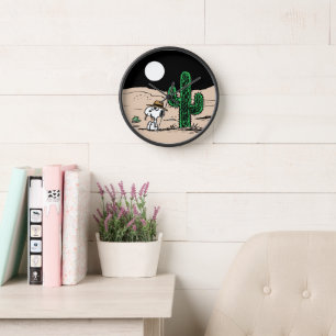 Horloge Spike dans un désert illuminé par la Lune