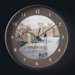 Horloge Winter at Windsor Castle<br><div class="desc">Basé sur ma peinture acrylique de Winter dans Windsor Castle, Angleterre. Une belle scène hivernale du château de Windsor lorsque la neige recouvrait le jardin et les arbres autour. Personnalisable à Zazzle avec votre propre texte pour un design personnalisé. Consultez mon magasin pour trouver les articles correspondants !</div>
