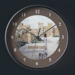 Horloge Winter at Windsor Castle<br><div class="desc">Basé sur ma peinture acrylique de Winter dans Windsor Castle,  Angleterre. Une belle scène hivernale du château de Windsor lorsque la neige recouvrait le jardin et les arbres autour. Personnalisable à Zazzle avec votre propre texte pour un design personnalisé. Consultez mon magasin pour trouver les articles correspondants !</div>