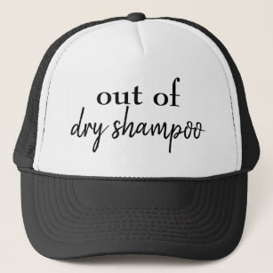 Hors du casquette sec de shampooing