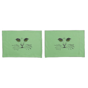 Housse D'oreillers Dessin en noir d'un chat face aux yeux verts brill