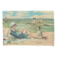 Fille et chien victoriens vintage au bord de la me