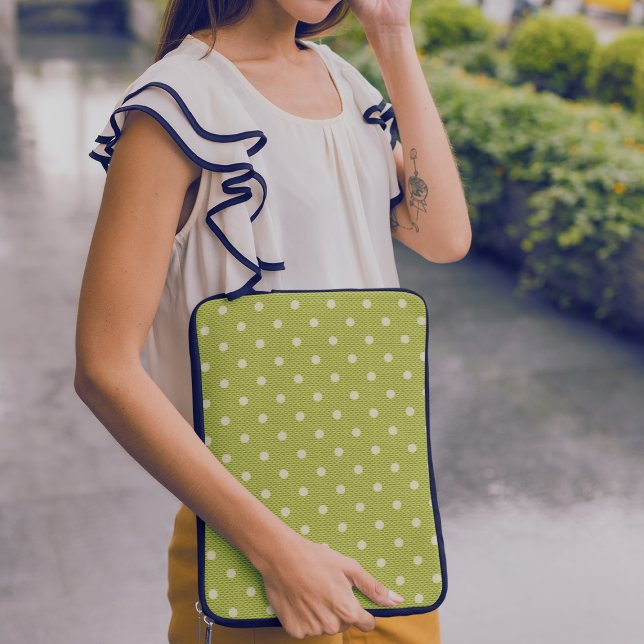Housse Pour Ordinateur Portable Dotty Delight Green (A woman is standing with a laptop in a Dotty Delight Green Laptop Sleeve.)
