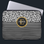 Housse Pour Ordinateur Portable Élégant Manche d'ordinateur portable Léopard Noir<br><div class="desc">Un motif léopard noir et blanc à rayures noires et blanches et un monogramme d'or et de noir décorent cette pochette d'ordinateur portable. Personnalisez-le pour vous-même ou pour un cadeau ! Conçu pour vous par Blackberry Boulevard.</div>