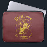 Housse Pour Ordinateur Portable GRYFFINDOR™ Determination Courage Bravery Crest<br><div class="desc">Show your house pride with this bold Gryffindor™ crest design, celebrating the values that define the bravest of witches and wizards. Featuring the iconic lion standing proudly before a shield, this striking artwork highlights Gryffindor’s core traits — Courage, Determination, and Bravery — in a powerful, vintage-inspired layout. The rich house...</div>