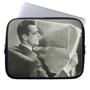 Housse Pour Ordinateur Portable Homme d'affaires lisant le journal