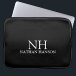 Housse Pour Ordinateur Portable Monogramme noir simple moderne<br><div class="desc">Manche portable moderne avec un design noir simple et minimal avec votre monogramme en caractères gras avec votre nom.</div>