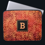 Housse Pour Ordinateur Portable Monogramme orange or ombre feuille motif moderne<br><div class="desc">Un motif en feuilles d'automne brillant d'or et de cuivre sombre sur un riche arrière - plan à texture rouge et orange brûlé orne cette manche d'ordinateur portable en néoprène moderne et tendance. Customisez cette manche élégante avec votre monogramme initial. Fait une déclaration chic et élégante à chaque utilisation. Cette...</div>