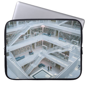 HOUSSE POUR ORDINATEUR PORTABLE PERSONNES MARCHANT À L'INTÉRIEUR DE LA BIBLIOTH