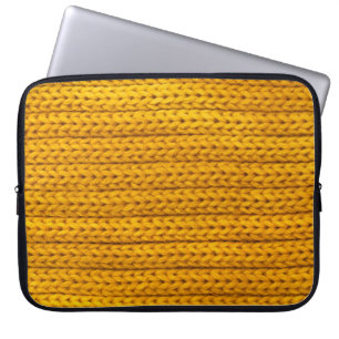 Housse Pour Ordinateur Portable Un motif de tissu de fil jaune tricoté.