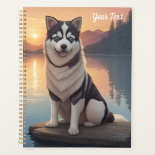 Husky sibérien au bord d'un lac