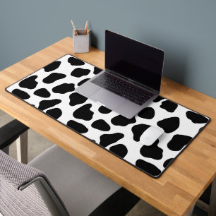 Impression de vache noire et blanche