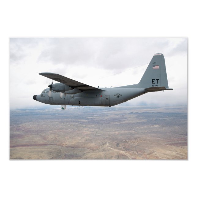Impression Photo Un Hercules C-130 s'envole dans le ciel (Devant)