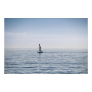 Impression Photo Un voilier sur une mer calme