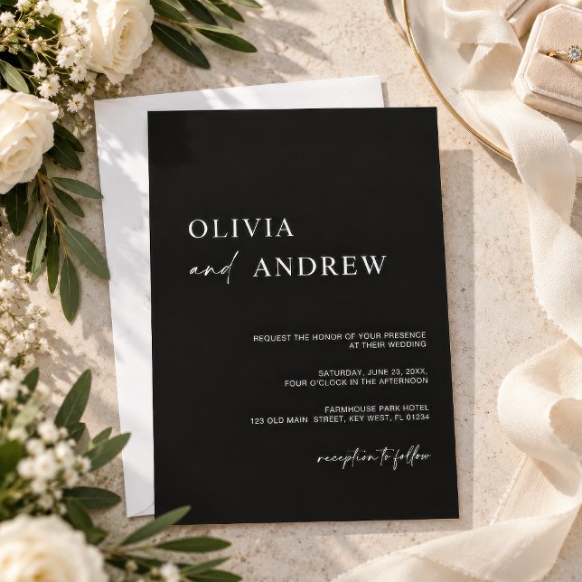 Invitation de mariage minimaliste noire simple (Simple black minimalist wedding invitation on a neutral table with olive branches and white flowers)