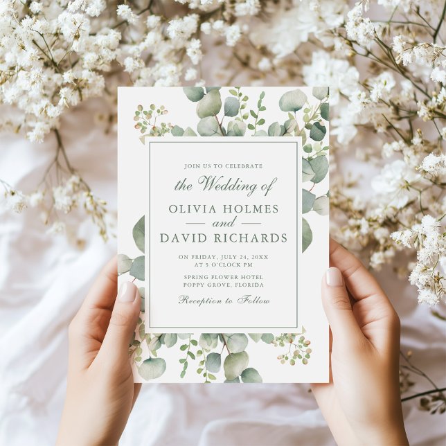 Invitation Élégante verdure Eucalyptus botanique de mariage (Elegant Greenery Eucalyptus Botanical Wedding Invitation in hands next to tiny white flowers.)
