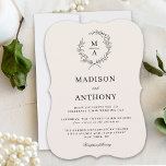 Invitation Light Ecru Simple Elegant Monogram Wedding<br><div class="desc">A tasteful and classic choice in wedding invitations, this design conveys a simple elegance in its text layout and bracket shape style. A simple open laurel wreath of sketched leaves surrounds the monogram initial of the bride and groom on a neutral light ecru background. The elegant yet simple text template...</div>