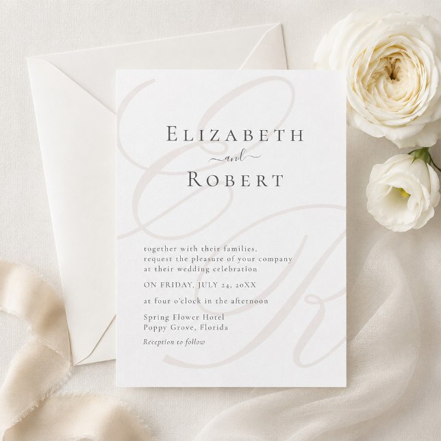 Invitation Mariage Élégant Minimaliste Monogramme (Elegant Minimalist Monogram Wedding Invitation on a table with white flowers)