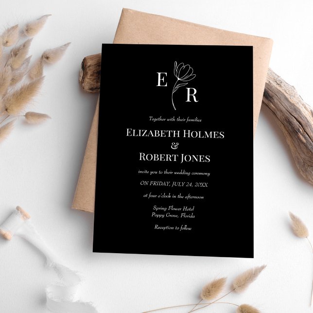 Invitation Monogramme Floral Noir Moderne de Mariage (Modern Black Floral Monogram Wedding Invitation on white table with neutral boho decoration.)