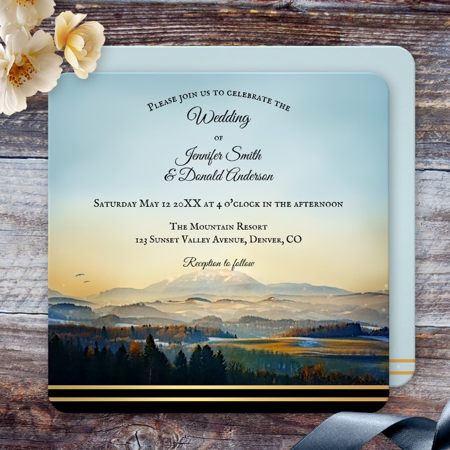 Invitation Paysage de montagne Peinture Mariage artistique (Wedding invitation featuring a colorful landscape scene with mountains and a golden lining)