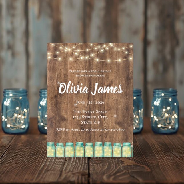 Invitation Pot Mason Bleu et Lumières de Fée pour une Baby Sh (Woodland bridal shower hero image with string lights and blue mason jar invitation)