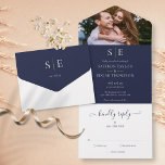 Invitation Tout En Un Navy Blue And Gold Monogram Photo Wedding<br><div class="desc">This chic minimalist all in one wedding invitation can be personalized with your special photo, monogram initials and wedding day information on a navy blue background. The invitation includes a perforated RSVP card that’s can be individually addressed or left blank for you to handwrite your guest's address details. Designed by...</div>