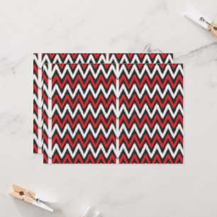Invitation un motif en zigzag rouge et noir sur fond blanc