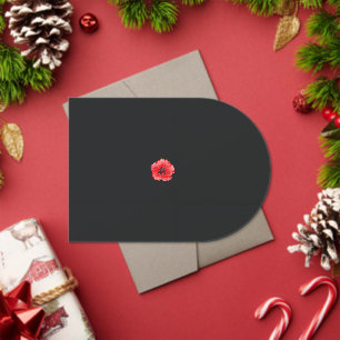 Invitations En Acrylique une fleur rouge avec un centre noir sur un dossier
