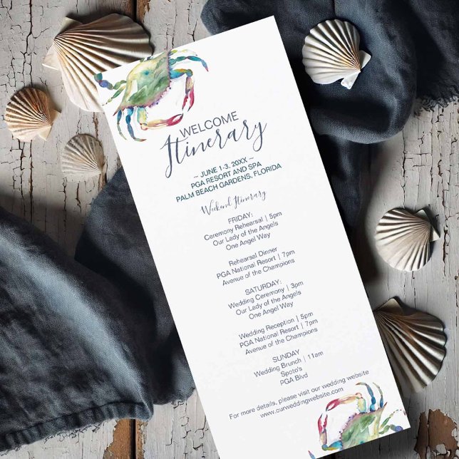 Itinéraire Mariage de crabe d'aquarelle (Flat lay of a watercolor crab wedding itinerary card featuring a blue crab illustration)