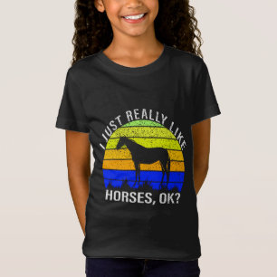 J'aime vraiment les chevaux en T-shirt bleu et jau