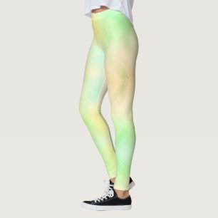 Jambes portant des leggings de couleur pastel
