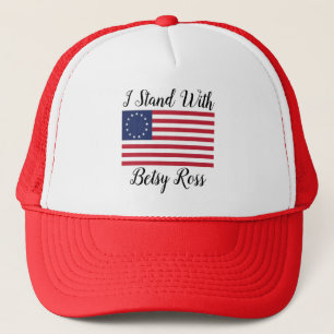 Je me tiens avec le casquette de Betsy Ross