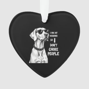 Je serre mon Weimaraner dans mes bras pour ne pas