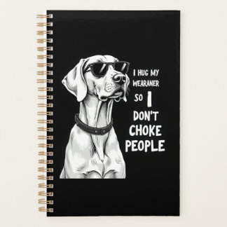 Je serre mon Weimaraner dans mes bras pour ne pas