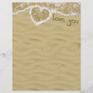 "Je t'aime" Cœur écrit dans le Sable