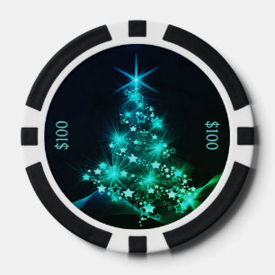 Jetons De Poker Lueur verte d'étoiles sur l'arbre de Noël sombre