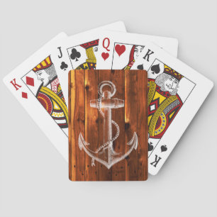 Jeu De Cartes Ancre vintage sur les planches en bois foncé