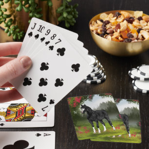 Jeu De Cartes Cheval arabe noir dans une prairie printanière